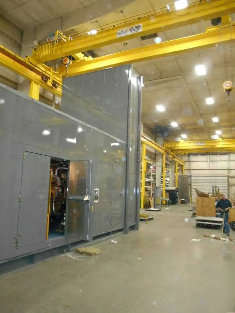 Rooftop enclosures housing a generator and compressor