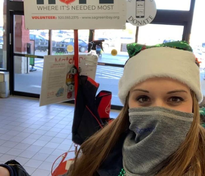 Cassie bell ringing for The Salvation Army